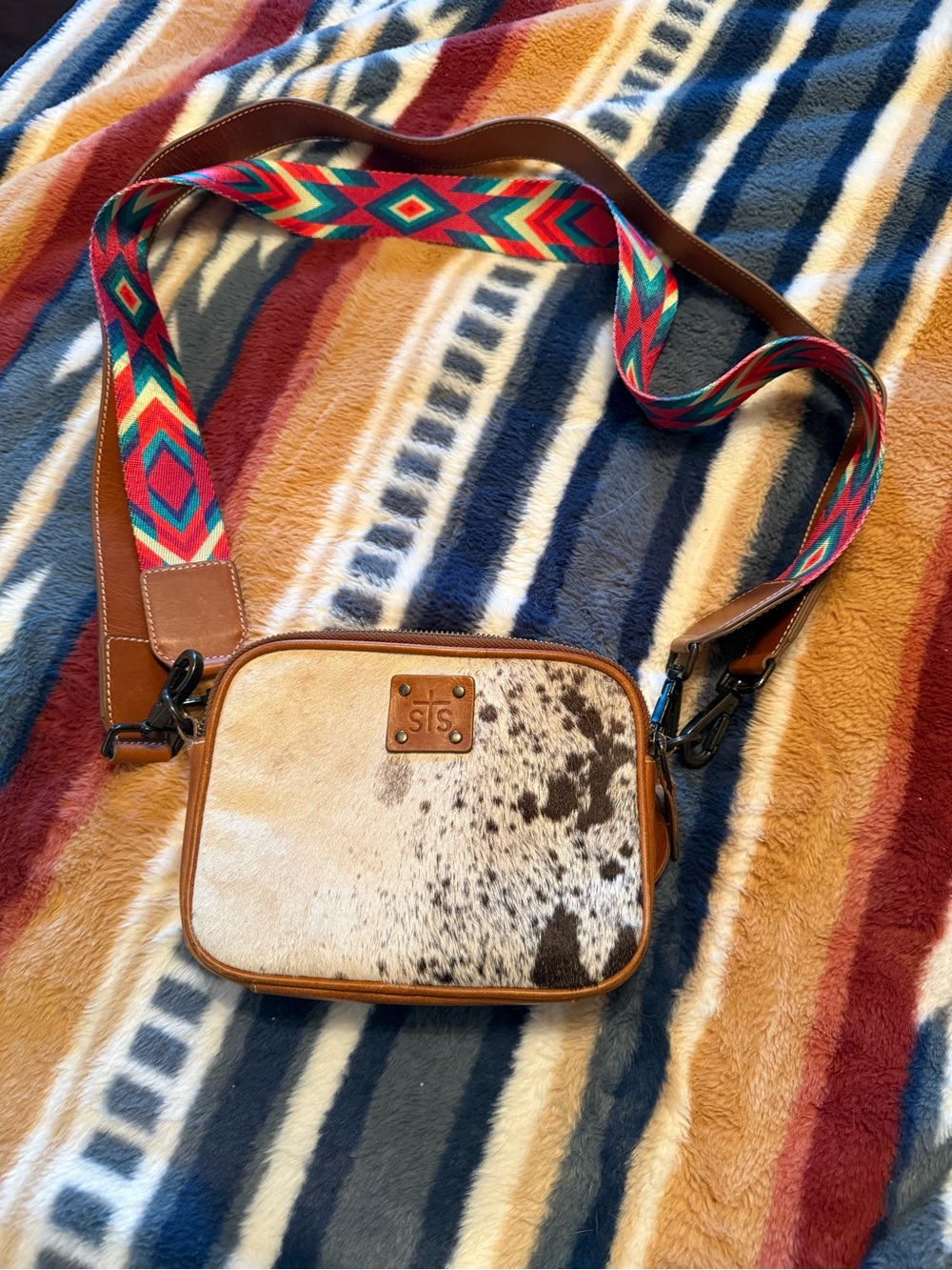 STS Ranchwear Brown and Cream Cowhide Crossbody with Colorful Aztec Strap